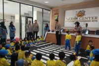 Kapolres Metro Tangerang Kota Kombes Pol Dr. Raden Muhammad Jauhari, S.H., S.I.K., M.Si. bersama personel Unit Kamsel Satlantas hadiri kegiatan polsanak PAUD SPS Dahlia Kelapa Dua